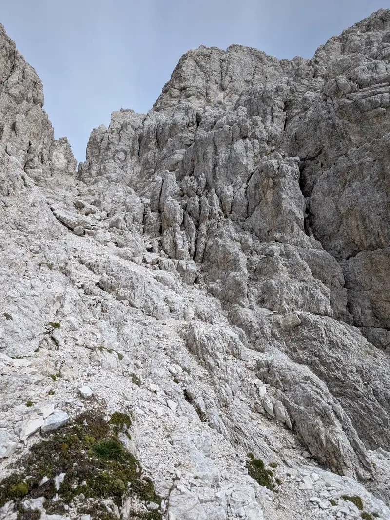 Cima del Vallone normal route overview - from here our general direction can be seen so first up via the bottom of the ravine, then to the rocks on the right, and with comibination of ledges and chimneys - to the top.