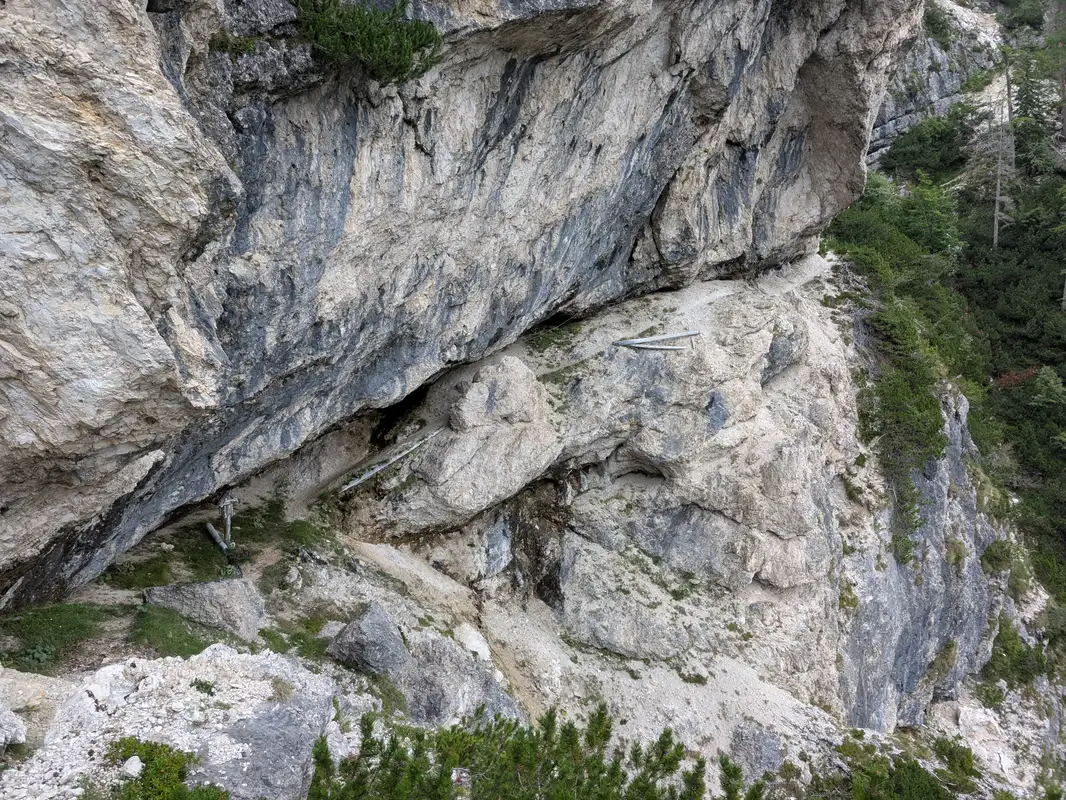 Sneaking under overhanging walls, watch out for dripping water.