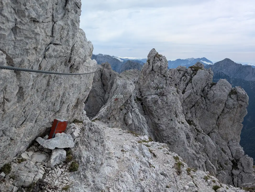 Memorial book and wire protection on crumbly traverse.