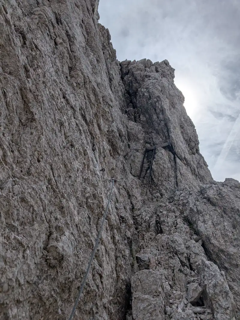 Descent to the base of the chimney. Quality of wires is supberb, it has been renewed lately. Old protection which is still in good shape was left as it is, so there's still a historical WWI vibe to it.