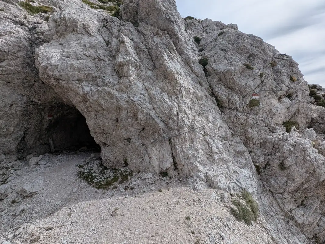 Wires lead us directly to tunnel entrance, here we leave the ridge and enter the underground bunker carved in the rock.