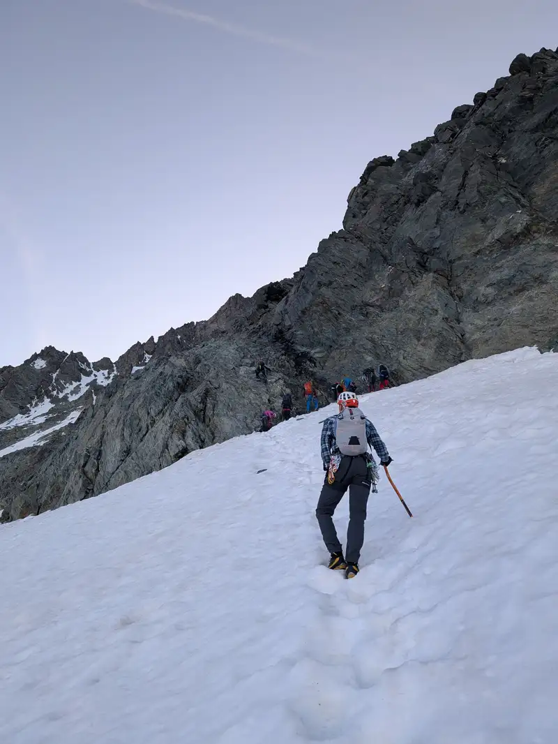 Last stretch of glacier is steeper, pickaxe comes in handy, especially that you may need to wait a bit before entering the actual rock.