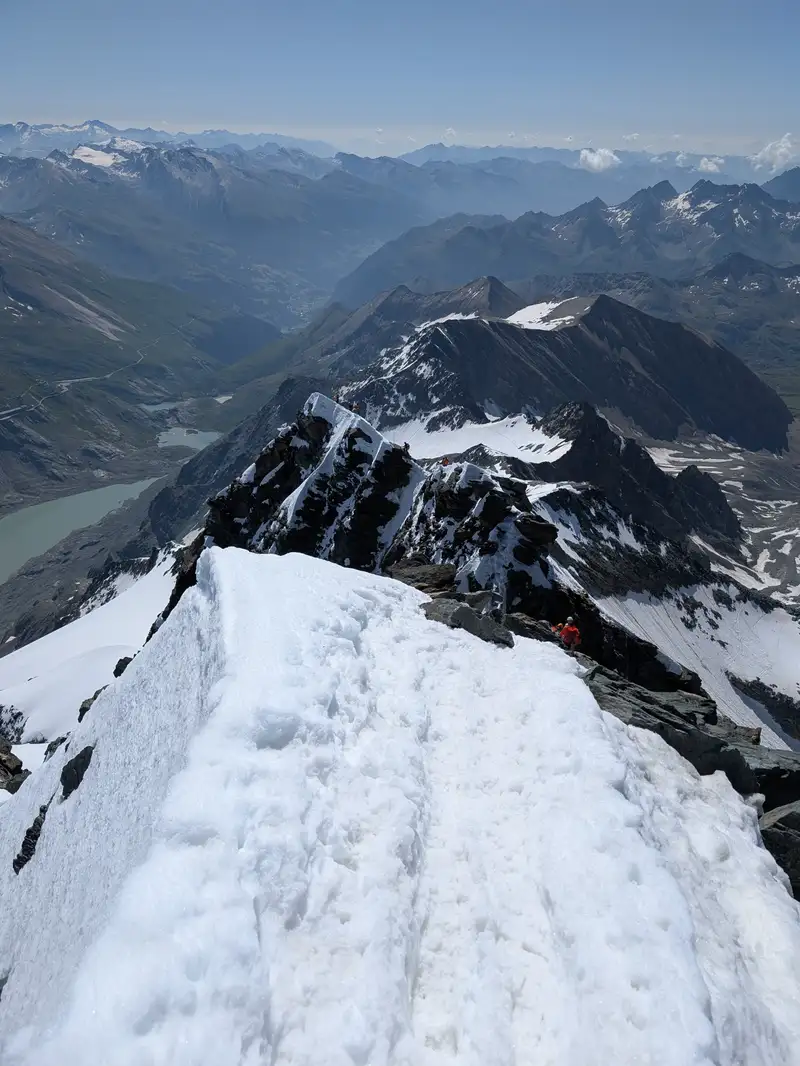 Kleinglockner seen while descending Grossglockner, just before small col separating the two. There is a wired cable to climb Kleinglockner.