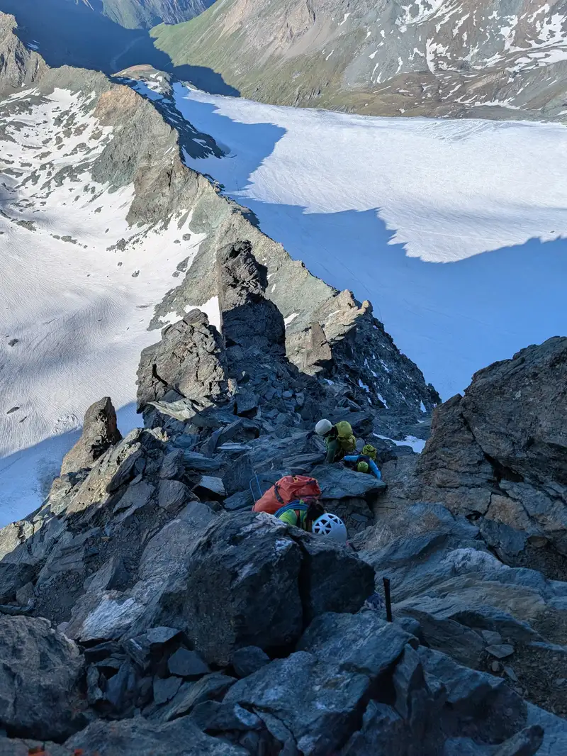 On reaching the edge of the ridge the rock becomes superb.