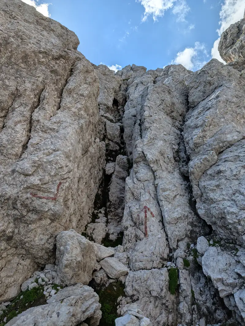 Eventually the rocks gets better and we need to use our hands. Don't miss this chimney when down-climbing (I did).