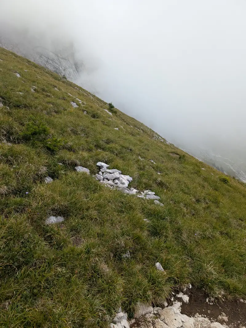 This is where we leave the Grebenska pot trail - on one of the zigzags where it becomes steeper. Then follow along that grassy slope traversing without gaining elevation.