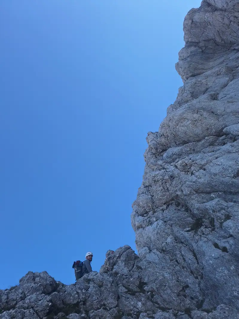 First stand belay and the pillar from second pitch visible above