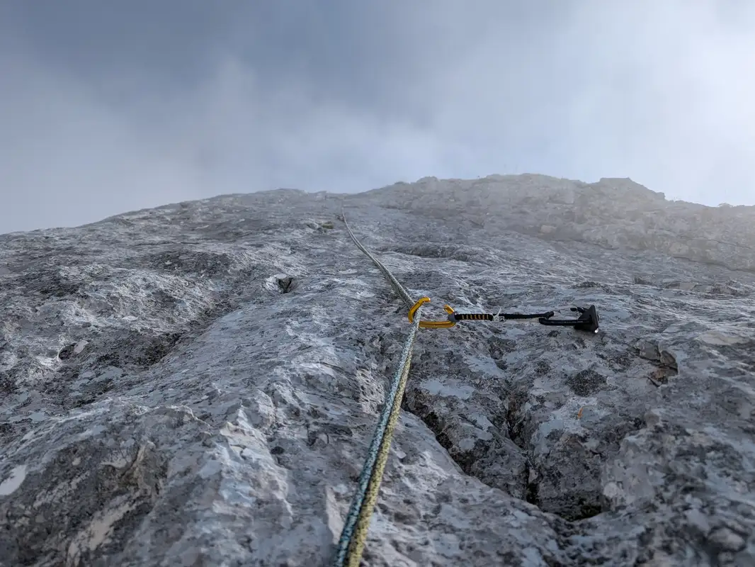 Terrain in the sixth pitch - crux of the route - probably many variants possible. Most manageable is to head for that slight overhang on the right - underclings help a lot in here.