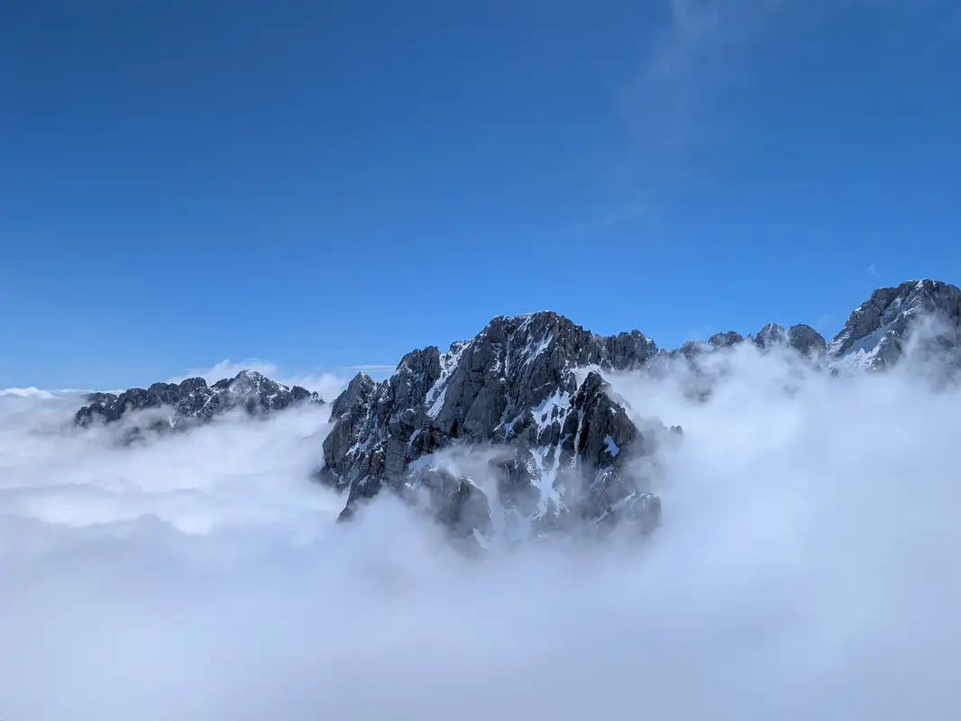 I got very limited views from the top, only in the direction of Martuljška peak group, Velika Martuljška Ponca and Škrlatica to mention the most prominent.