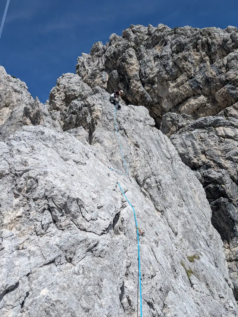 Crux of the route, first up that crack to the lowering in the ridge, then on its edge.